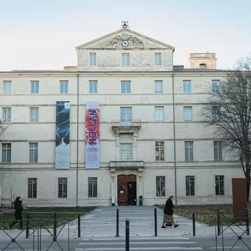 Montpellier, France - January 2, 2019: architectural detail of the Fabre museum next to the Place de la Comedie where people pass on a winter day; Shutterstock ID 1628380093; your: Sloane Tucker; gl: 65050; netsuite: Online Editorial; full: POI