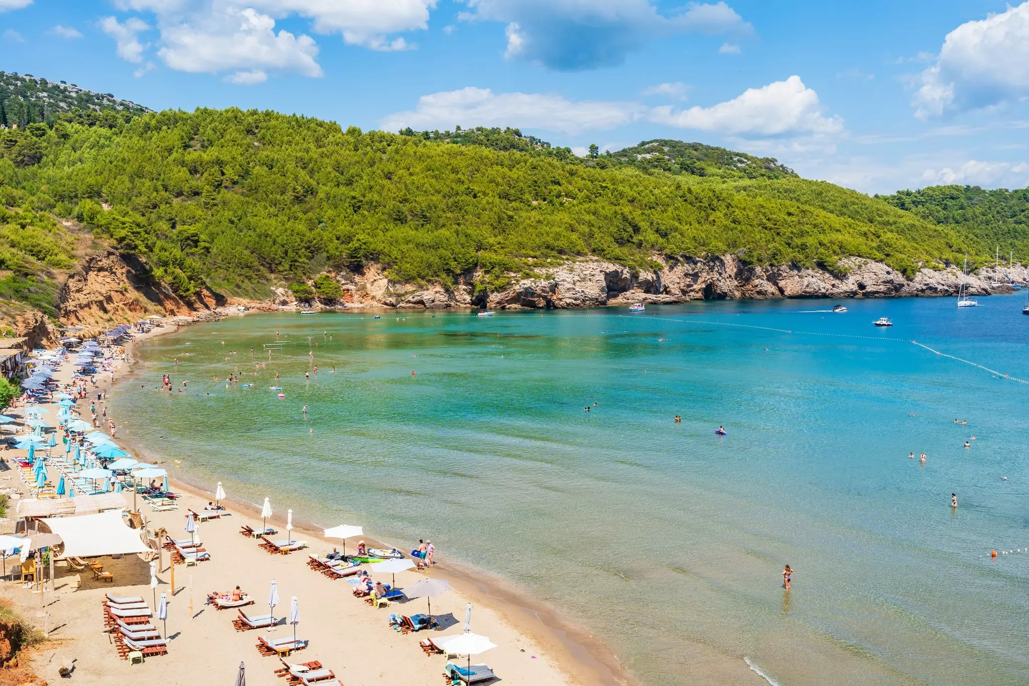 Holidaymakers enjoy summer vacation and crystal clear waters of Adriatic Sea around Lopud, one of the Elaphiti islands in the Adriatic Sea off the coast of Dalmatia