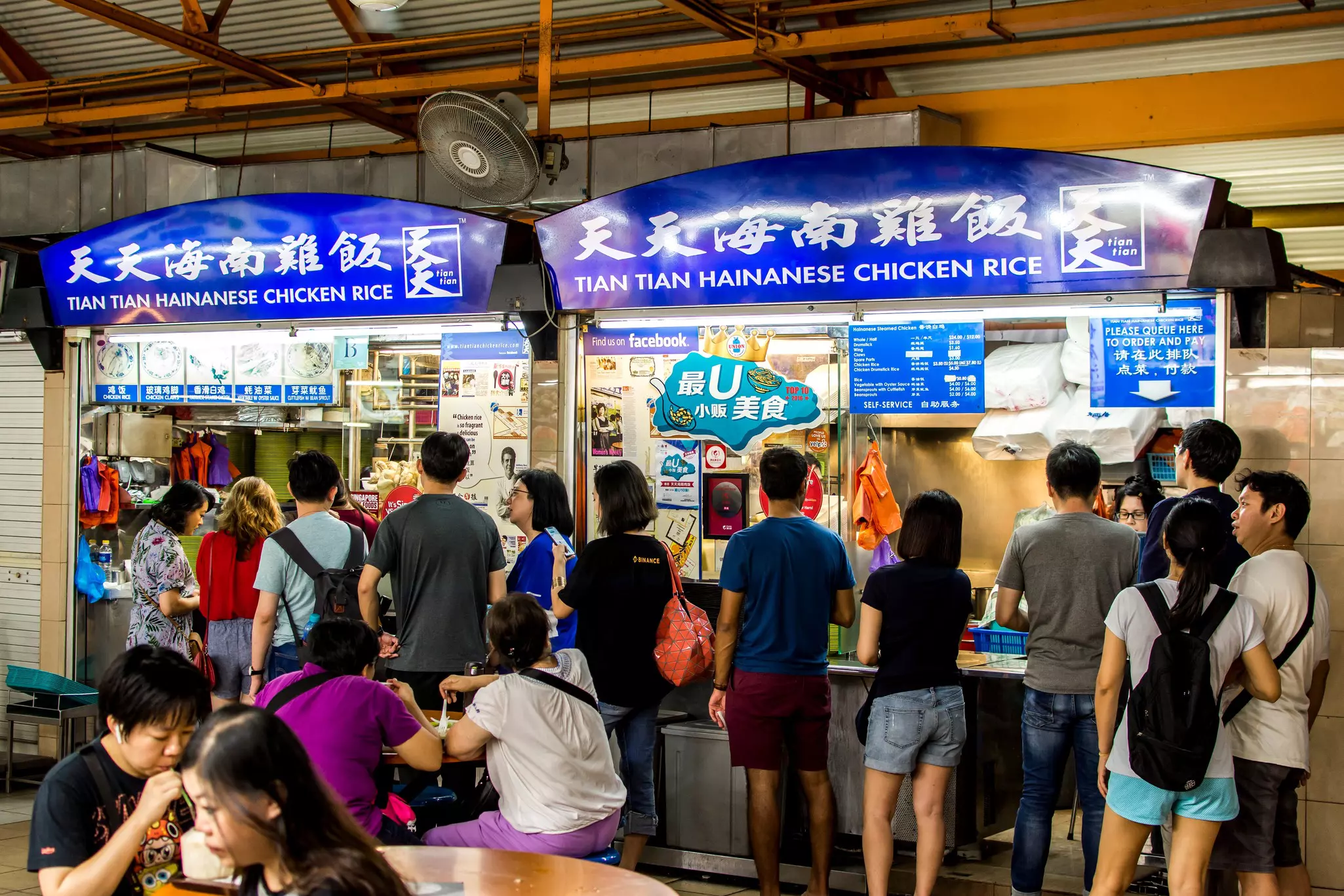 Queues at Tian Tian Hainanese Chicken Rice in the Maxwell Food Centre in Singapore. 