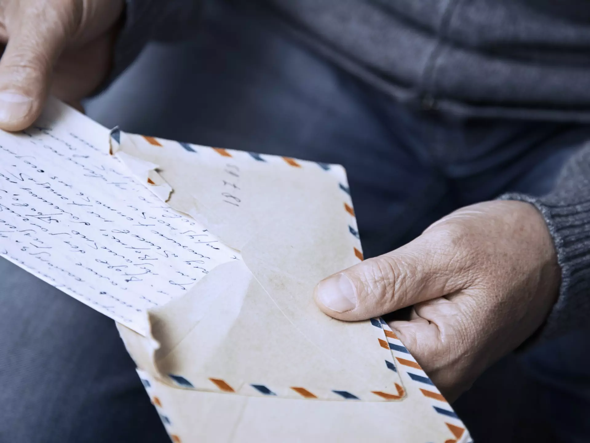 The idea of sending letters might seem passé, but during a time of social distancing, getting a penpal can help ease the isolation. Arman Zhenikeyev / The Image Bank / Getty Images