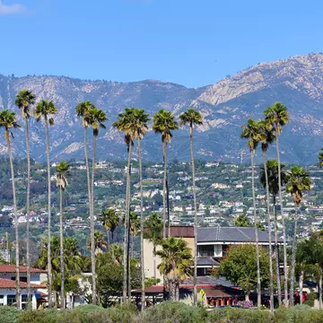 East Cabrillo Blvd in Santa Barbara, California, with the Riviera neighborhood and the Santa Ynez Mountains in the background. John Penney/Shutterstock