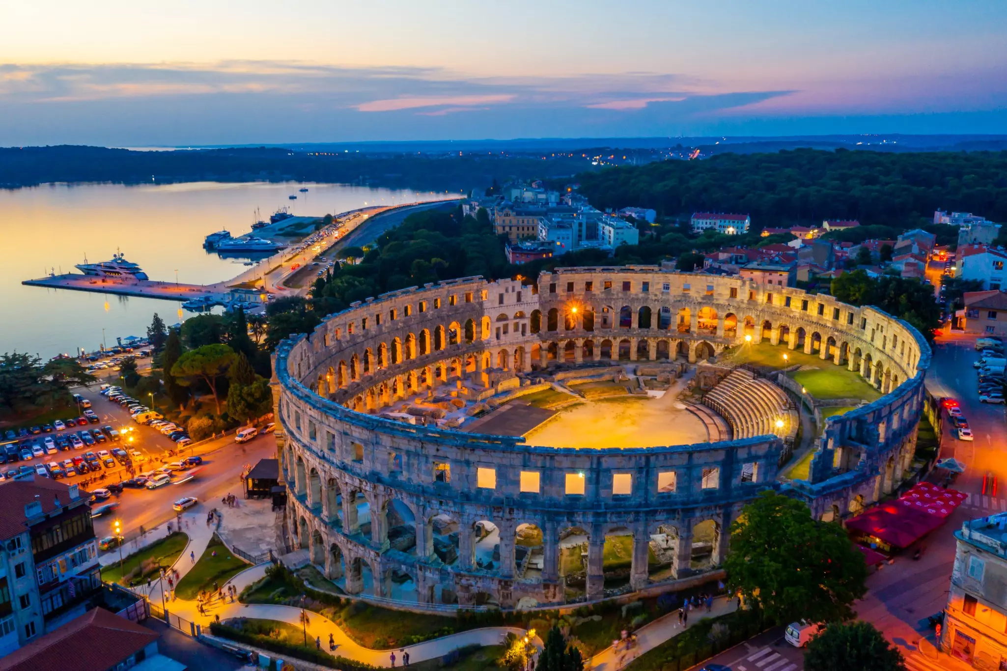A sunset aerial view of the Roman amphitheater in Pula, Croatia ©  trabantos / Shutterstock 