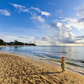 Woman walking on the beach of Paynes Bay at sunset. Surrounded by a beautiful stretch of sand, this is one of the most popular beach on the west coast of Barbados. Canon EOS 5D Mark II
155285028
Serene People, Tourism, Bikini Top, Mid Adult Women, Women, Females, Water Surface, Beauty In Nature, Antilles, Seascape, Sun Hat, Sarong, Walking, Scenics, Hat, Getting Away From It All, Idyllic, Relaxation, Tranquil Scene, Blue, Tropical Climate, Travel Destinations, Vacations, Nature, Wide Angle, Outdoors, Horizontal, Tourist, People, Barbados, West Indies, Caribbean, Sunlight, Sunset, Day, Summer, Sand, Beach, Landscape, Cumulus Cloud, Cloud - Sky, Sky, Caribbean Sea, Water's Edge, Water, Bikini, Nature, Travel Locations, People, Summer, Holidays