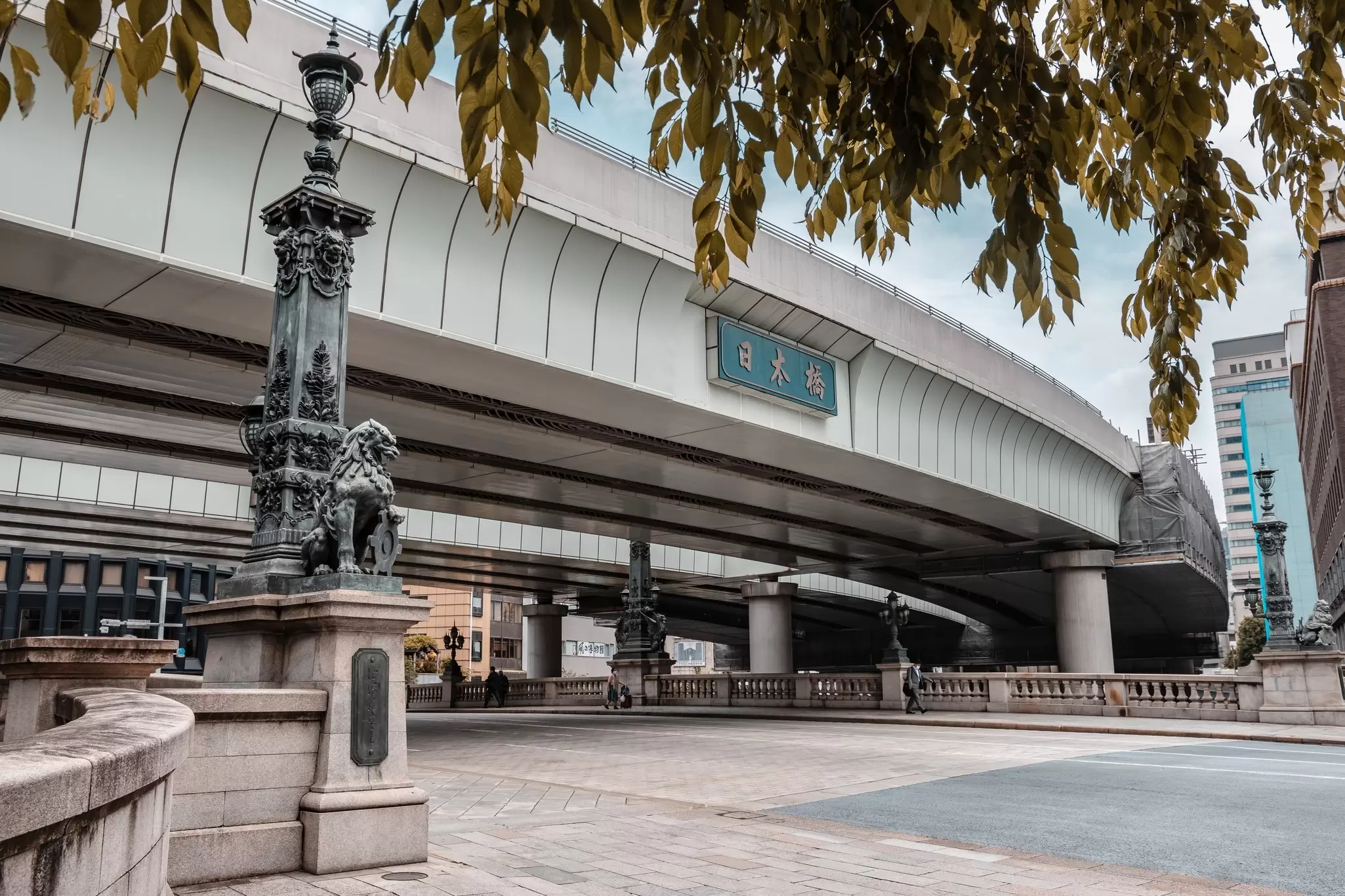 Tokyo, Japan - 05.2022: Nihonbashi Bridge with lion statue, one of the most historic bridge in Japan since Meiji era. One of the most popular tourist destinations in Tokyo metropolitan area.  License Type: media  Download Time: 2023-11-28T15:26:44.000Z  User: nic.dhoedt_lonelyplanet  Is Editorial: Yes  purchase_order:   