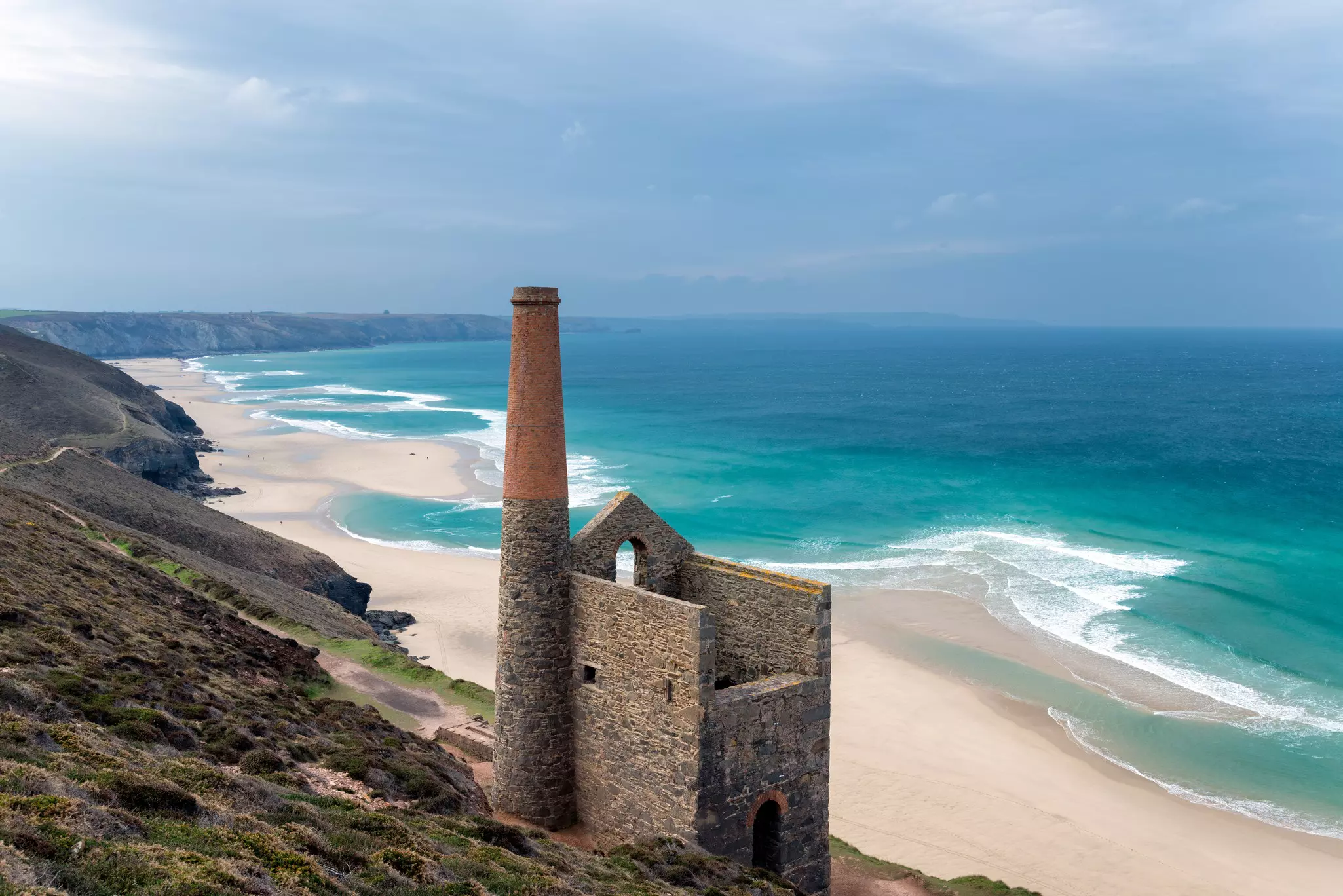 The ruins of an old Cornish engine house on the South West Coast Path as it passes through St Agnes on the north coast of Cornwall.