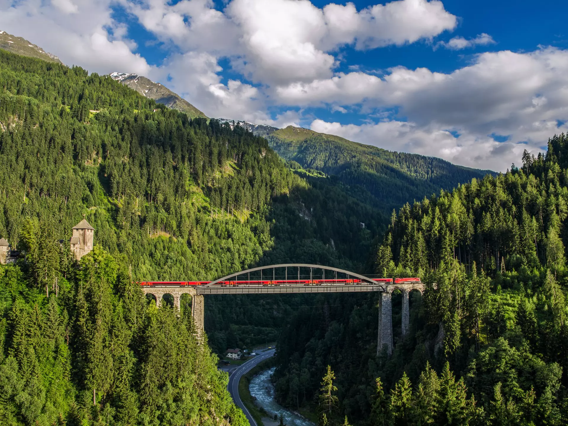 Gliding across the Tyrolean Mountains on a high-speed train is just one of the many transport options in Austria © traumlichtfabrik / Getty Images