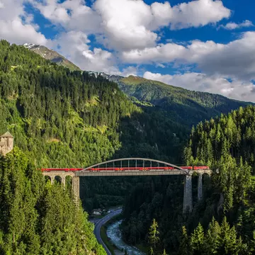 Gliding across the Tyrolean Mountains on a high-speed train is just one of the many transport options in Austria © traumlichtfabrik / Getty Images