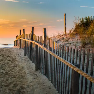 Sunrise glows at the Atlantic seashore at Marine St. in Beach Haven, New Jersey; Shutterstock ID 1782738350;