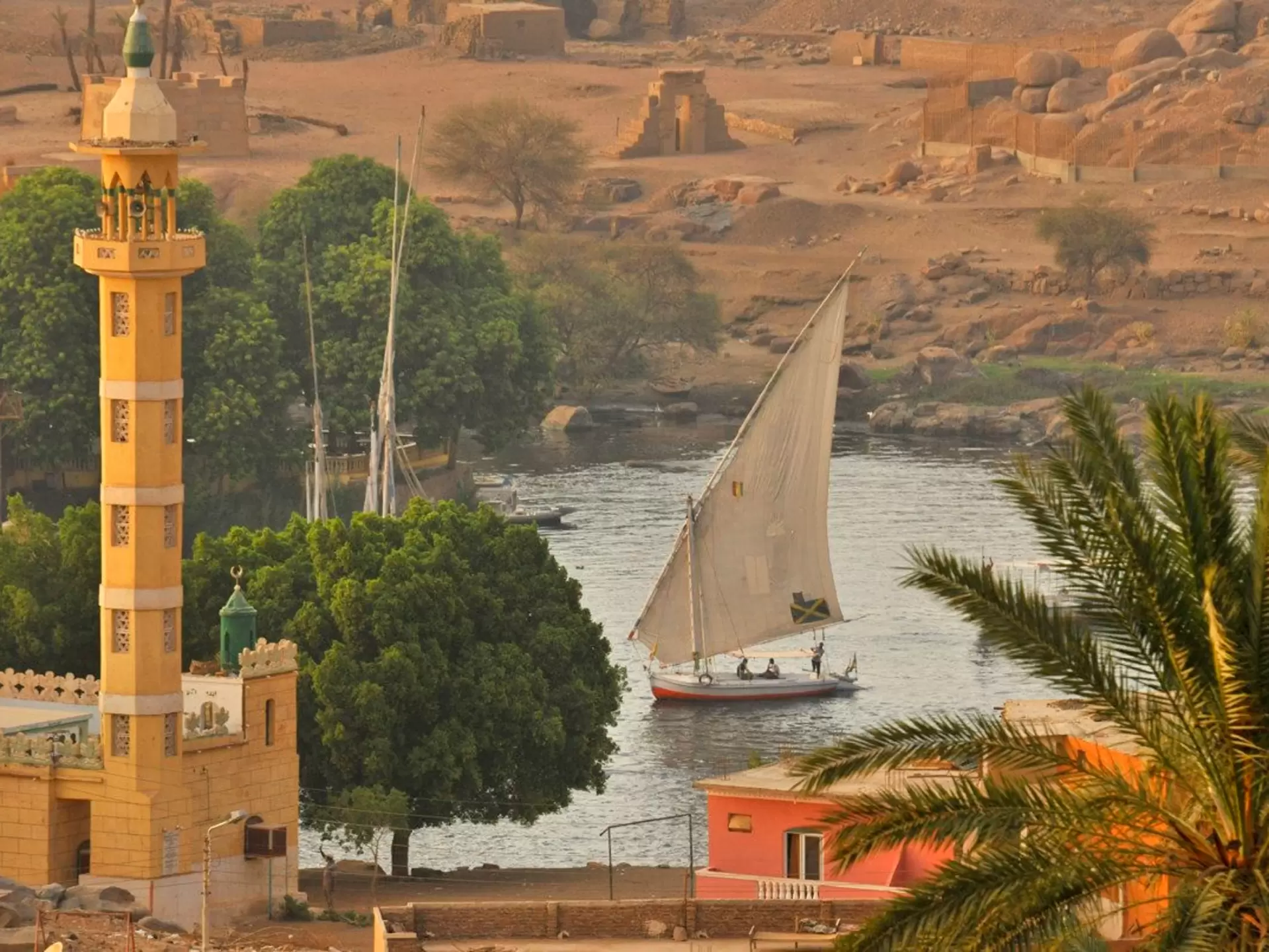 A felucca boat sailing on the River Nile near Aswan, Egypt. 