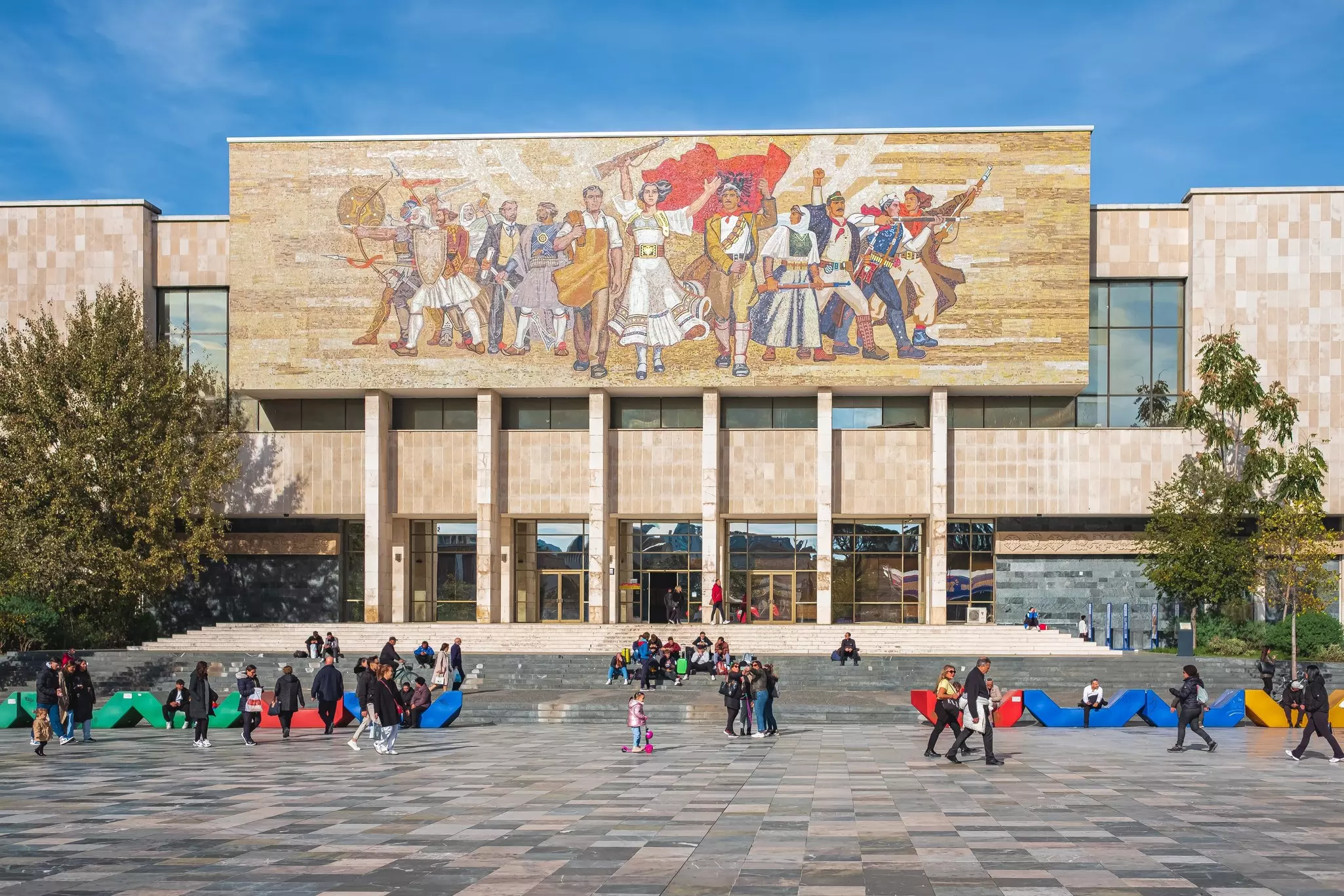 A large mosaic above a museum entrance in Albania.