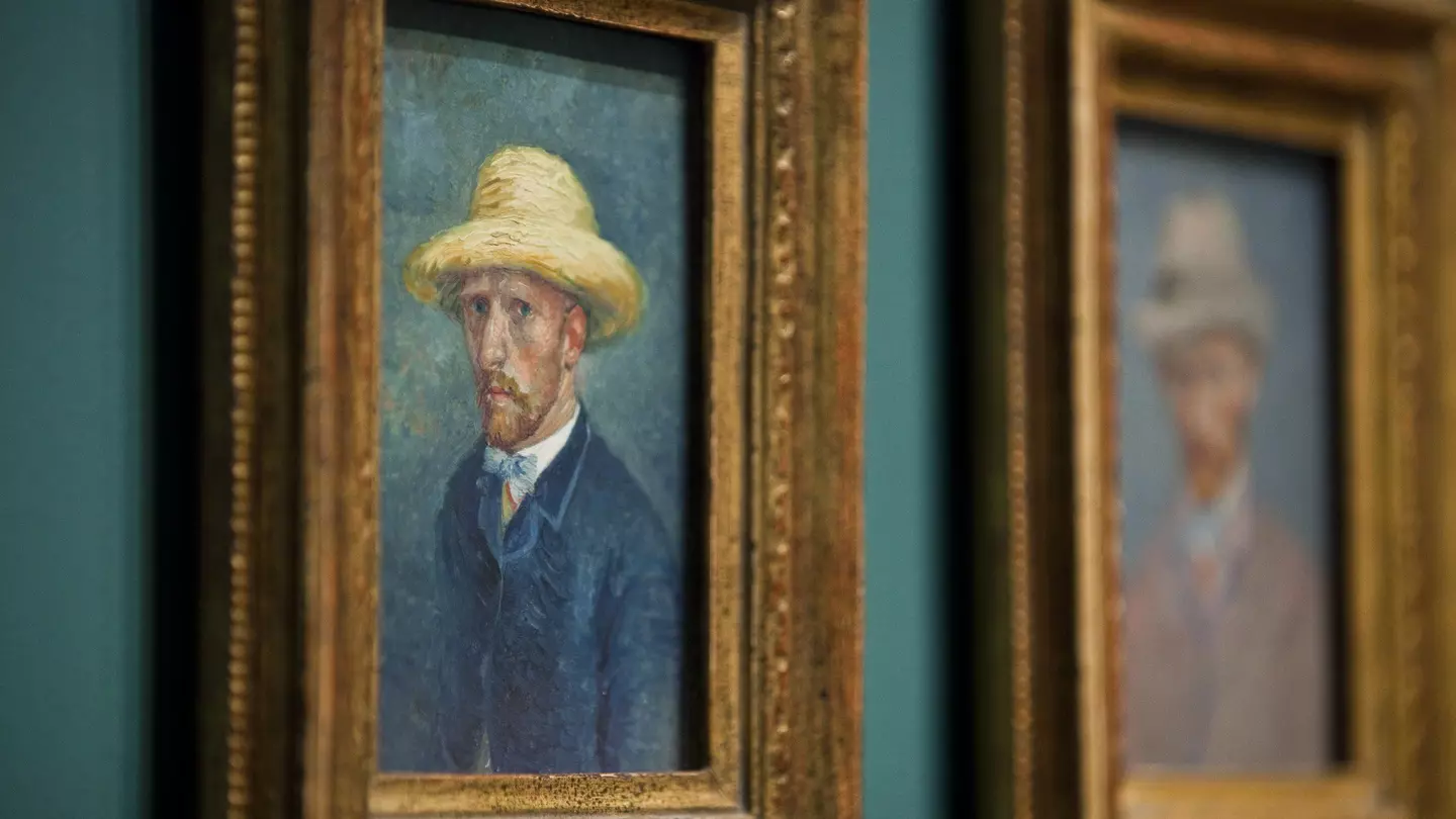 Two framed self-portraits of Vincent Van Gogh, hanging on the wall in the Van Gogh Museum, Amsterdam.