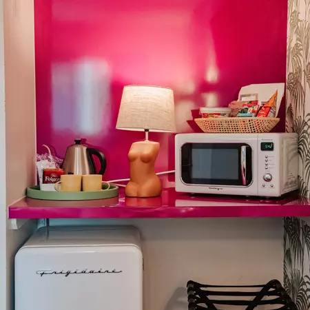 A small coffee and snack station in a guest room at Oklahoma City's Classen Inn.