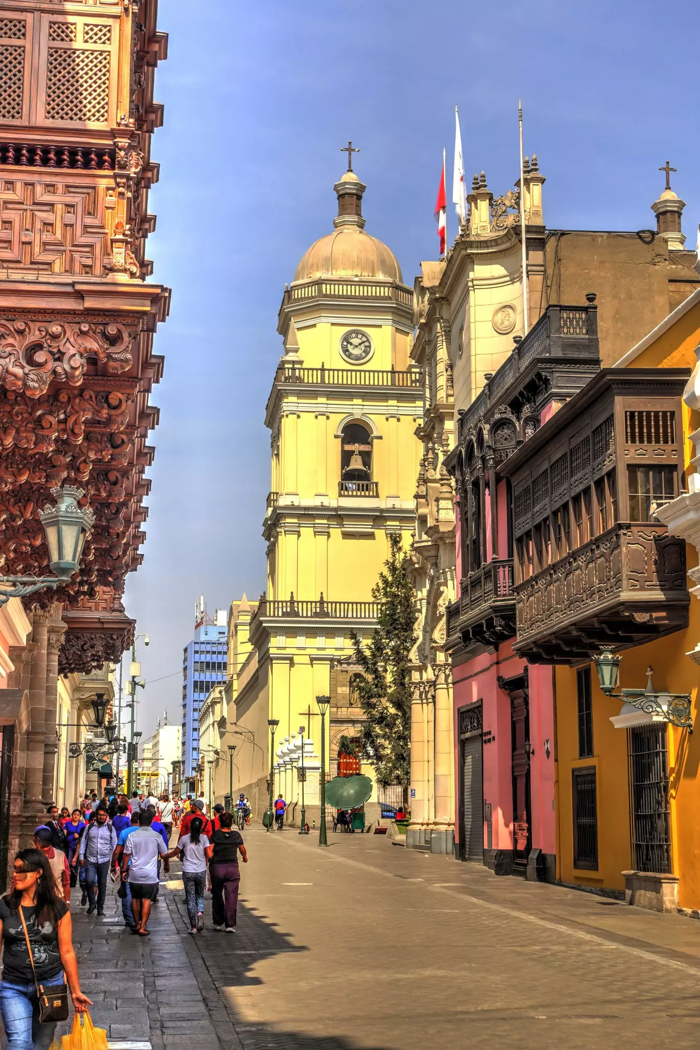 Street scene with pedestrians in historical center of Lima.