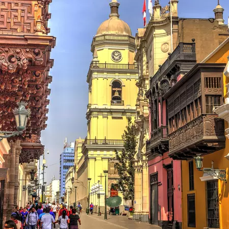 Street scene with pedestrians in historical center of Lima.