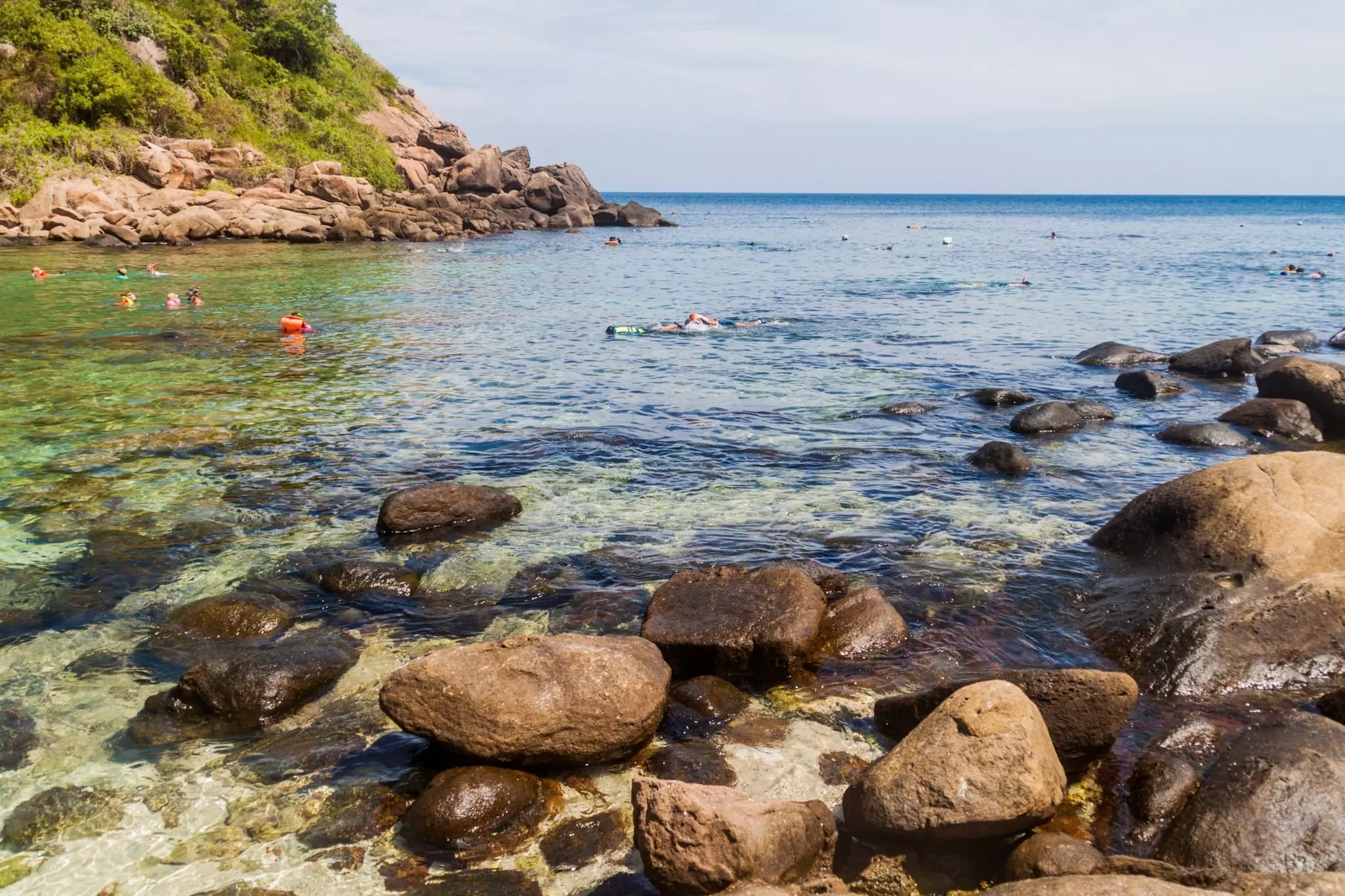Snorkelers in the water at Pigeon Island National Park, Sri Lanka