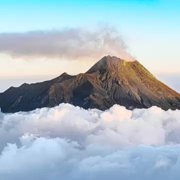 Top of Mount Merapi Summit Volcano above the clouds viewed from Mount Merbabu, License Type: media, Download Time: 2025-02-25T21:34:25.000Z, User: joebindloss38, Editorial: false, purchase_order: 65050 - Digital Destinations and Articles, job: Online Editorial, client: 10 best hikes in Indonesia, other: Joe Bindloss