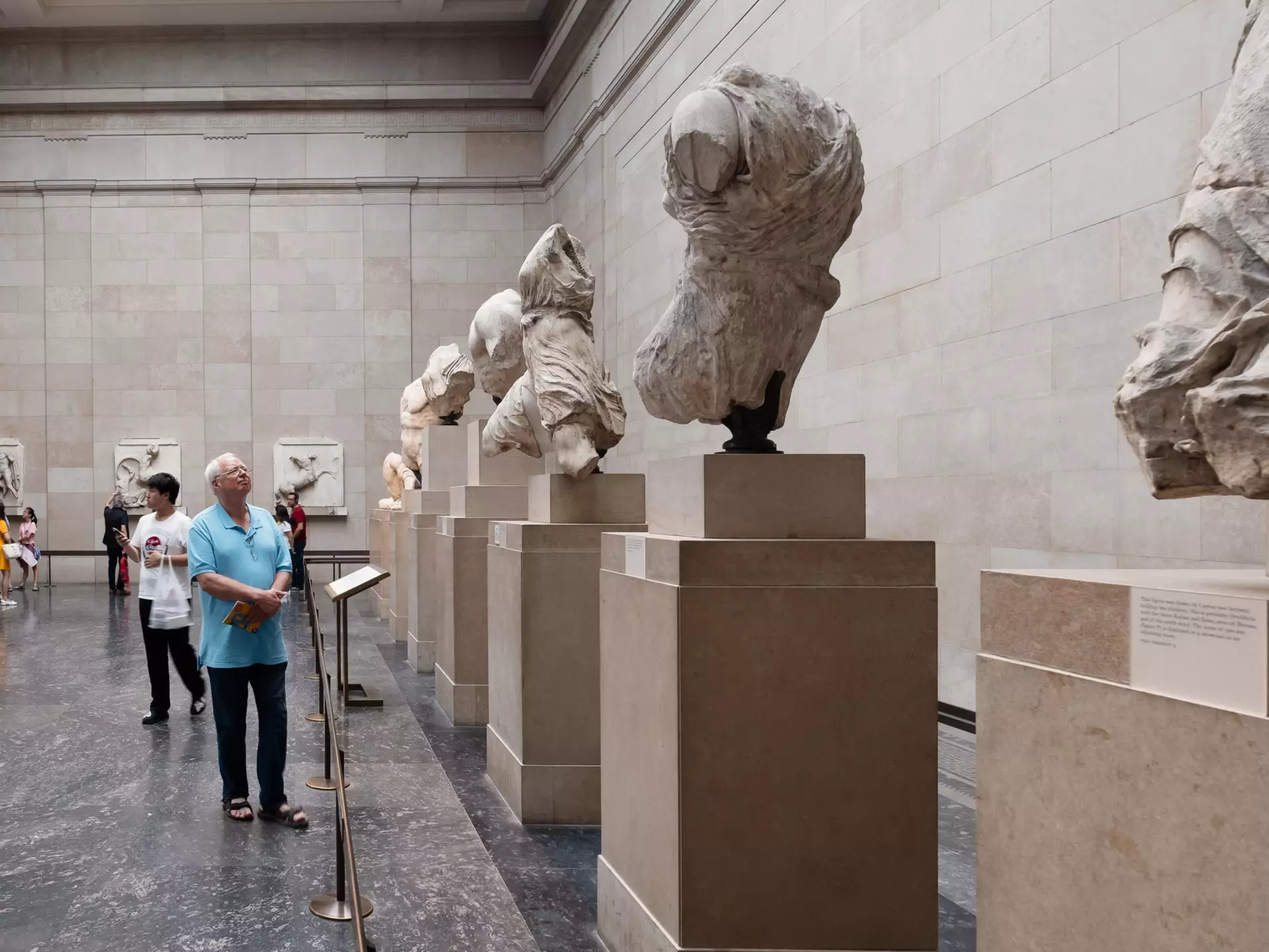 LONDON,UK - JULY 31,2019 : The Elgin Marbles, ancient greek antiquities from the Parthenon in Athens, at  the British Museum  License Type: media  Download Time: 2021-04-01T02:01:01.000Z  User: claramonitto  Is Editorial: Yes  purchase_order:   