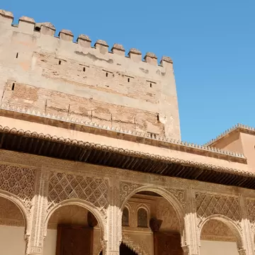 Detail of Comares Tower and Courtyard of the Myrtles or Court of the Blessing in the Alhambra of Granada, Spain