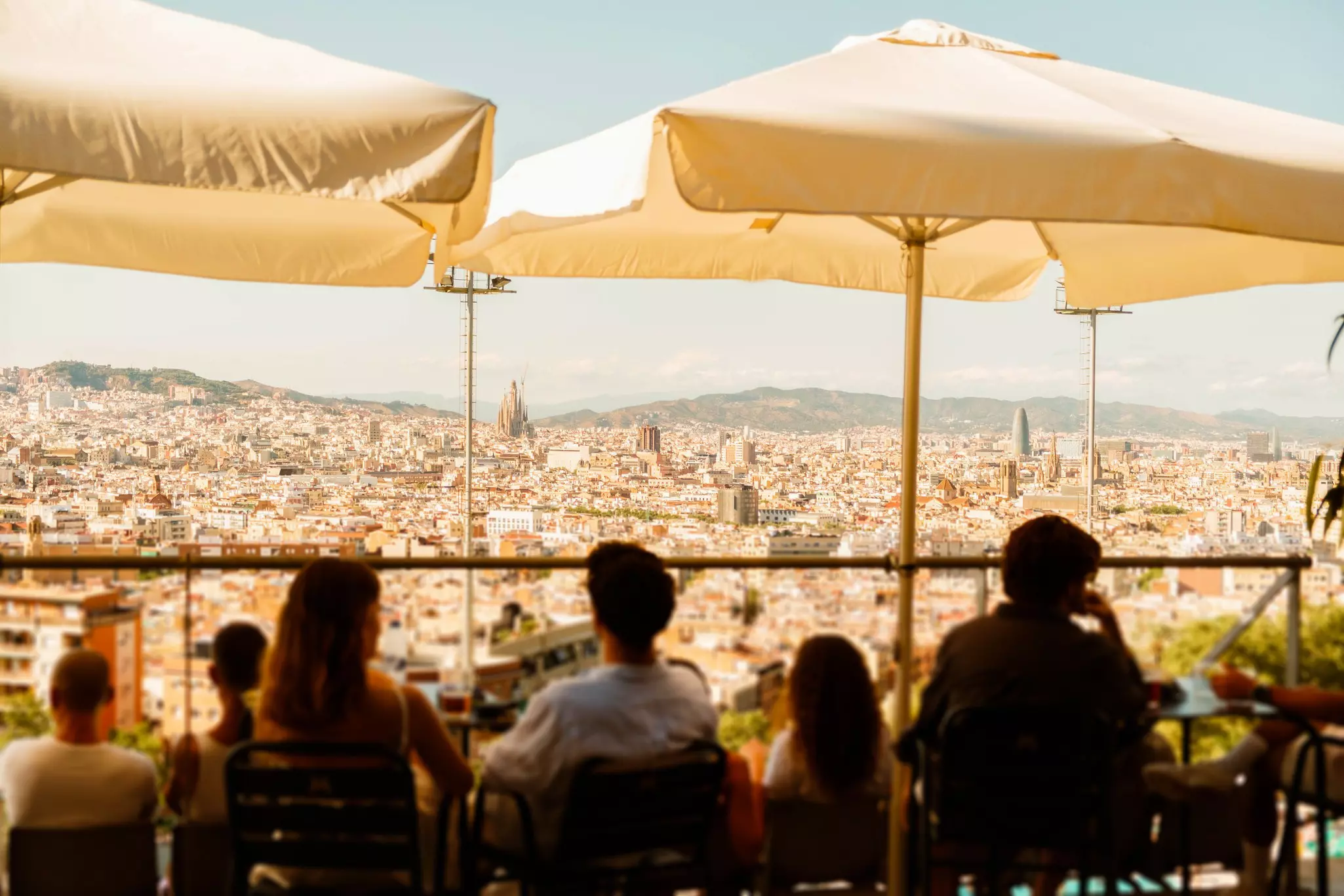 Sunset cocktails in Barcelona city with views of Sagrada Familia. 