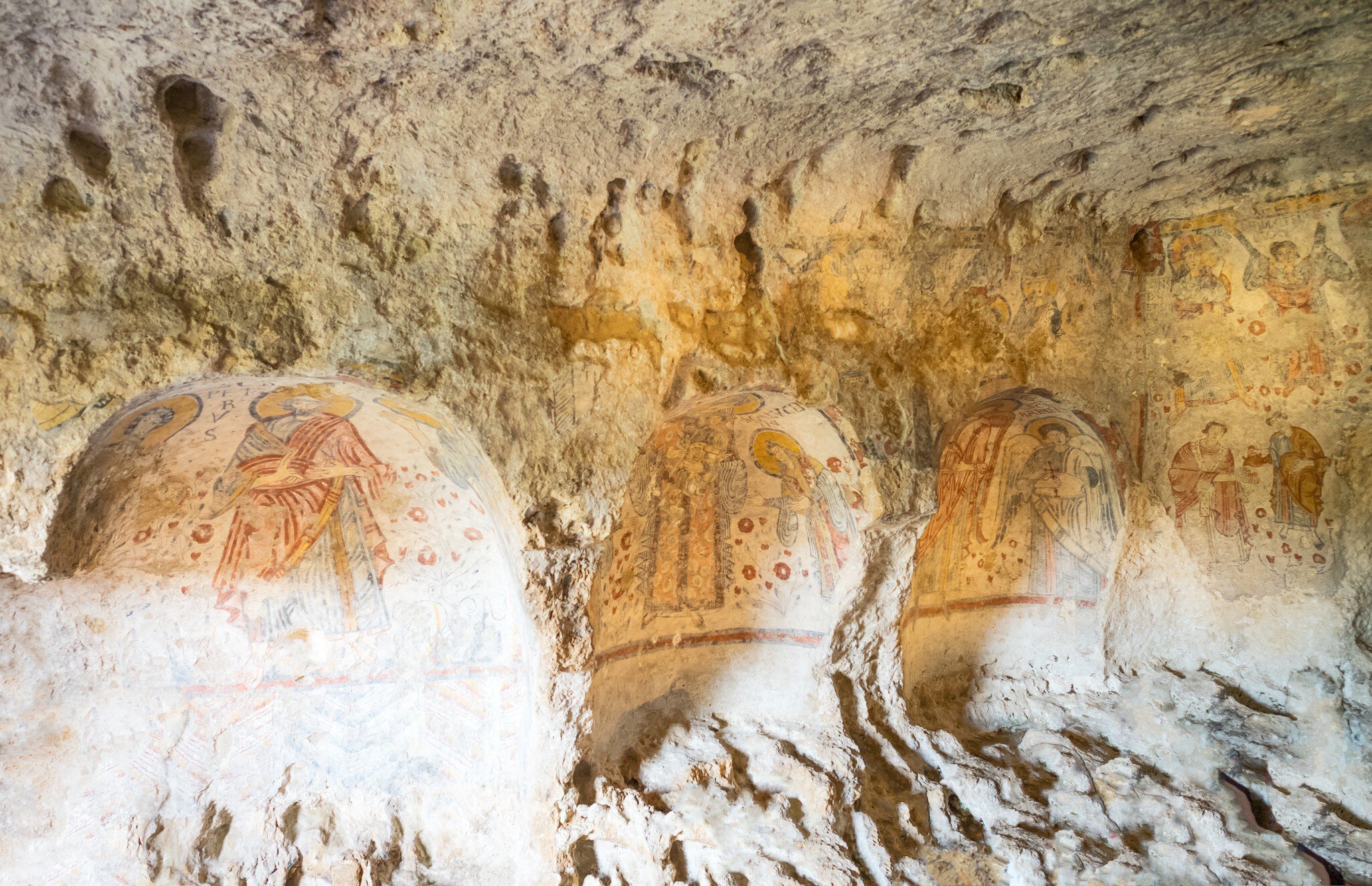 Matera, Italy - may 5, 2017: Visitors lloking at the ancient frescoes in the crypt of the Original Sin, License Type: media, Download Time: 2025-10-08T18:43:07.000Z, User: LP_YKhanna, Editorial: true, purchase_order: 65050 - Digital Destinations and Articles, job: Lonely Planet, client: App Content, other: Yuvraj Khanna