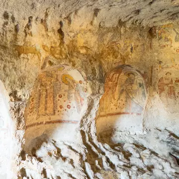 Matera, Italy - may 5, 2017: Visitors lloking at the ancient frescoes in the crypt of the Original Sin, License Type: media, Download Time: 2025-10-08T18:43:07.000Z, User: LP_YKhanna, Editorial: true, purchase_order: 65050 - Digital Destinations and Articles, job: Lonely Planet, client: App Content, other: Yuvraj Khanna