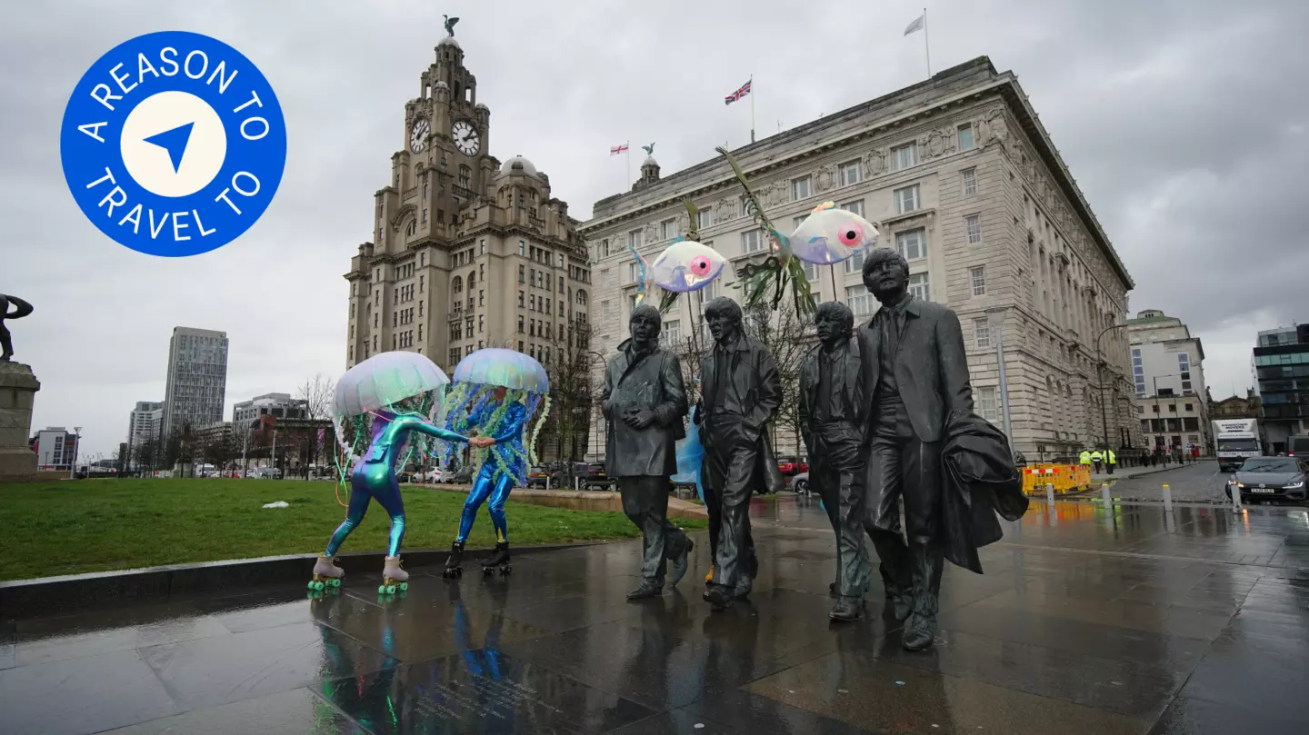 Roller skaters get into the Eurovision spirit next to the famous statue of the Beatles by the Liverpool waterfront © Peter Byrne / PA Images via Getty Images