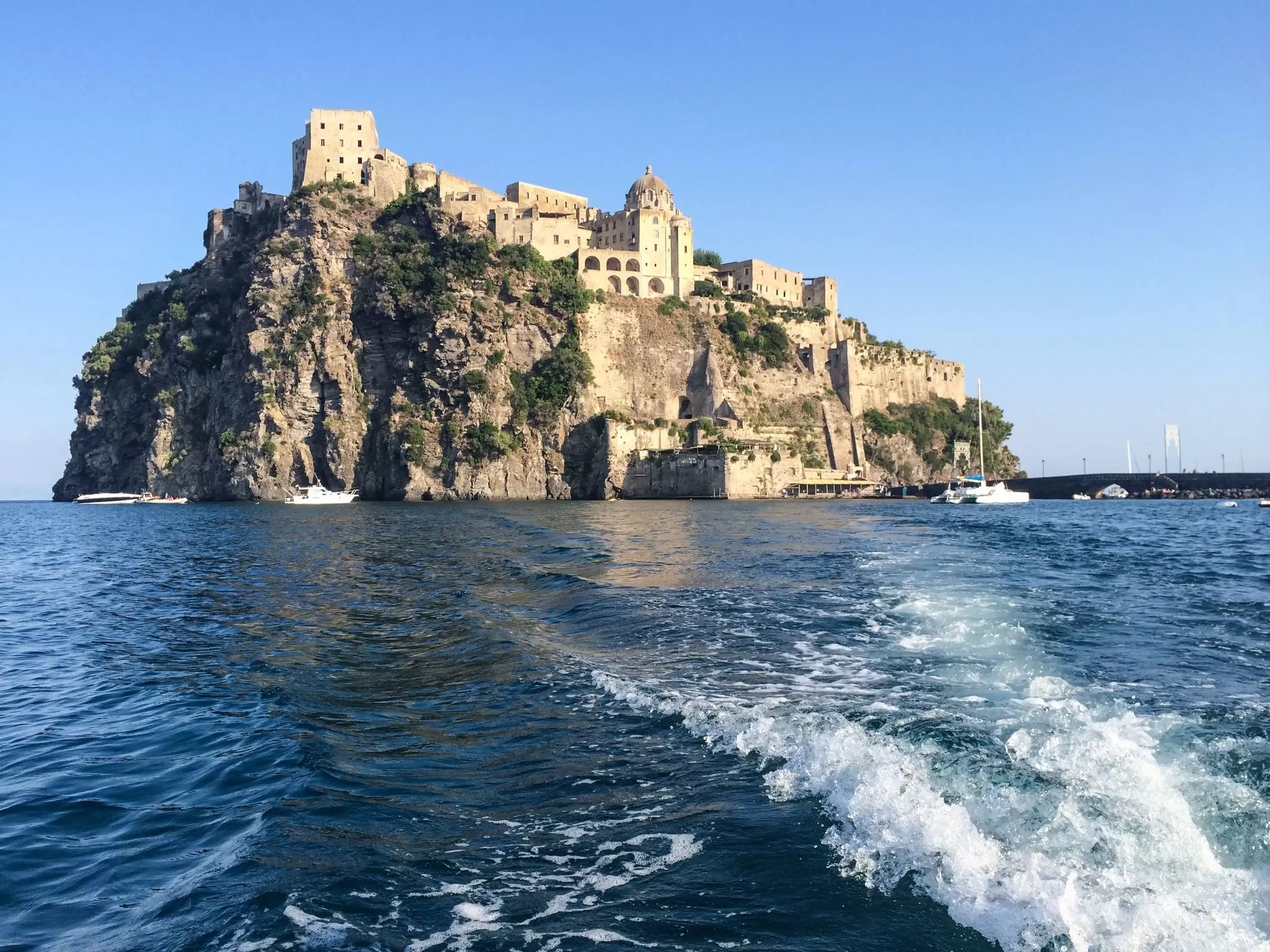 Castello Aragonese on a beautiful day as seen from the Sea.