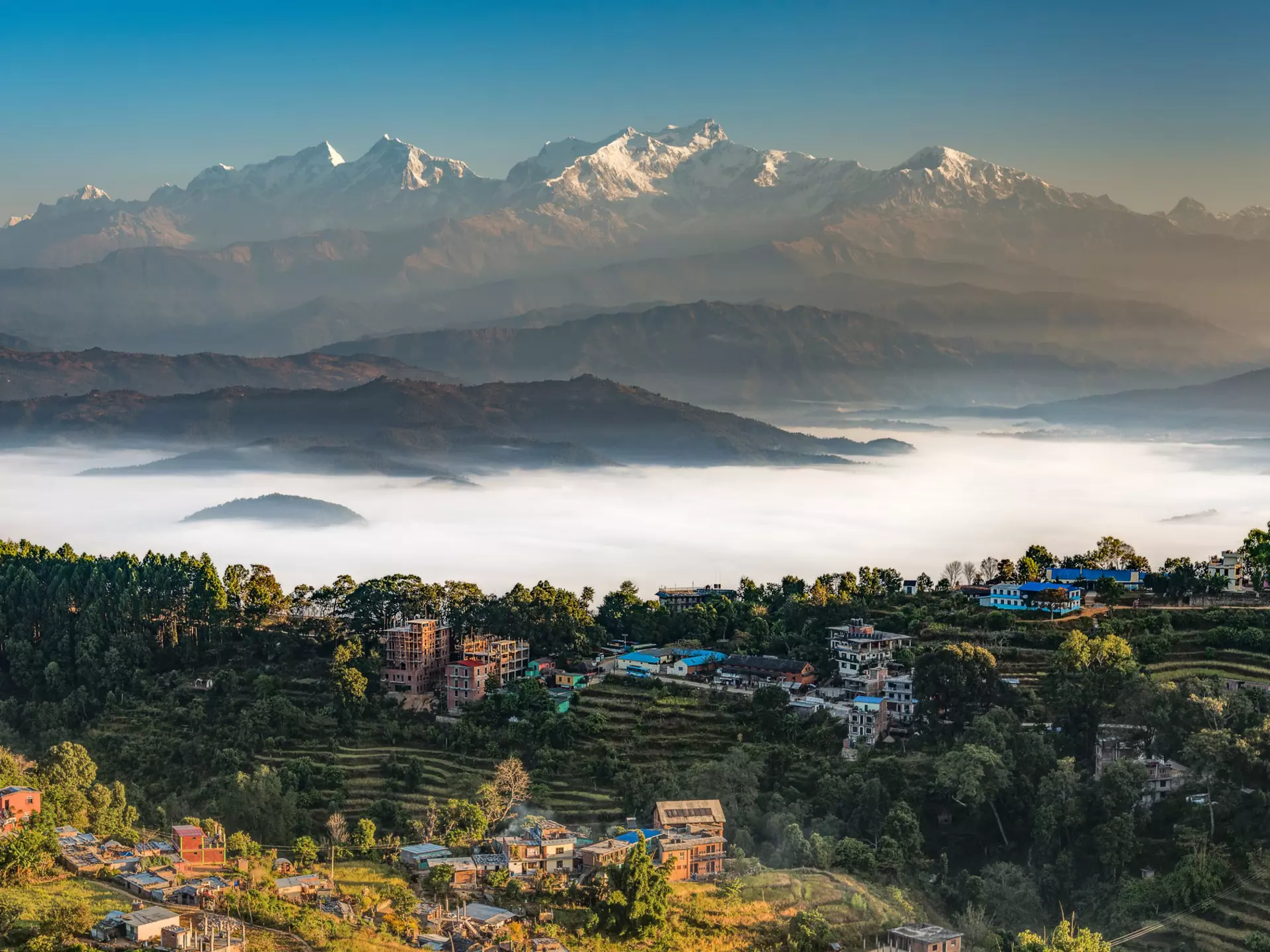 The Himalaya and the town of Bandipur, Nepal. traumlichtfabrik/Getty Images