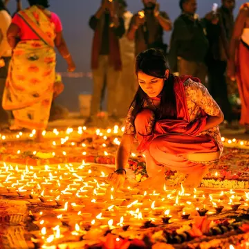 Celebrating Diwali in Varanasi, India. Itiprithul/Shutterstock