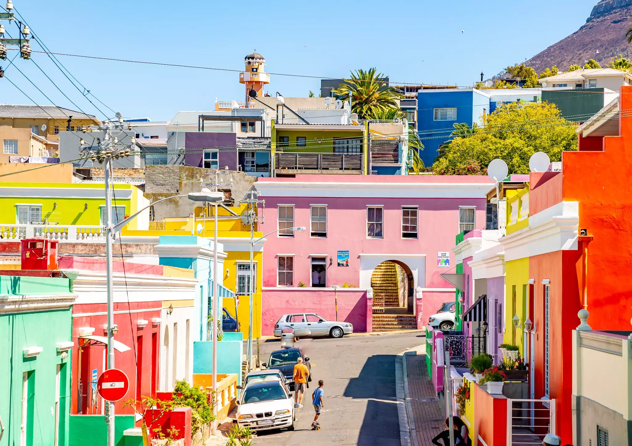 Some of Cape Town's neighborhoods and cultural hubs, like Bo-Kaap, are best visited with a local guide. Subodh Agnihotri/Getty Images