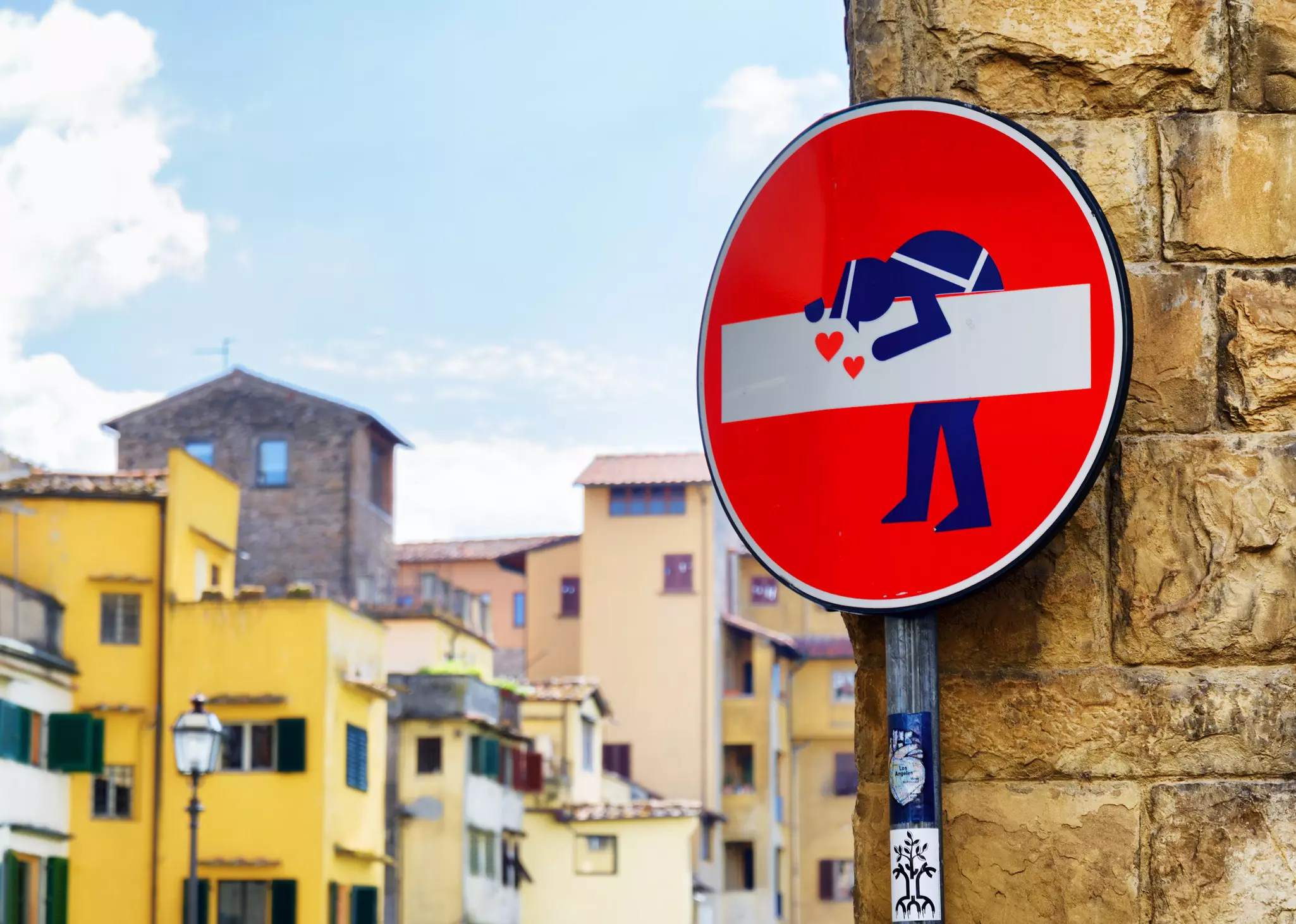 Traffic sign turned into humorous art by French artist Clet Abraham
