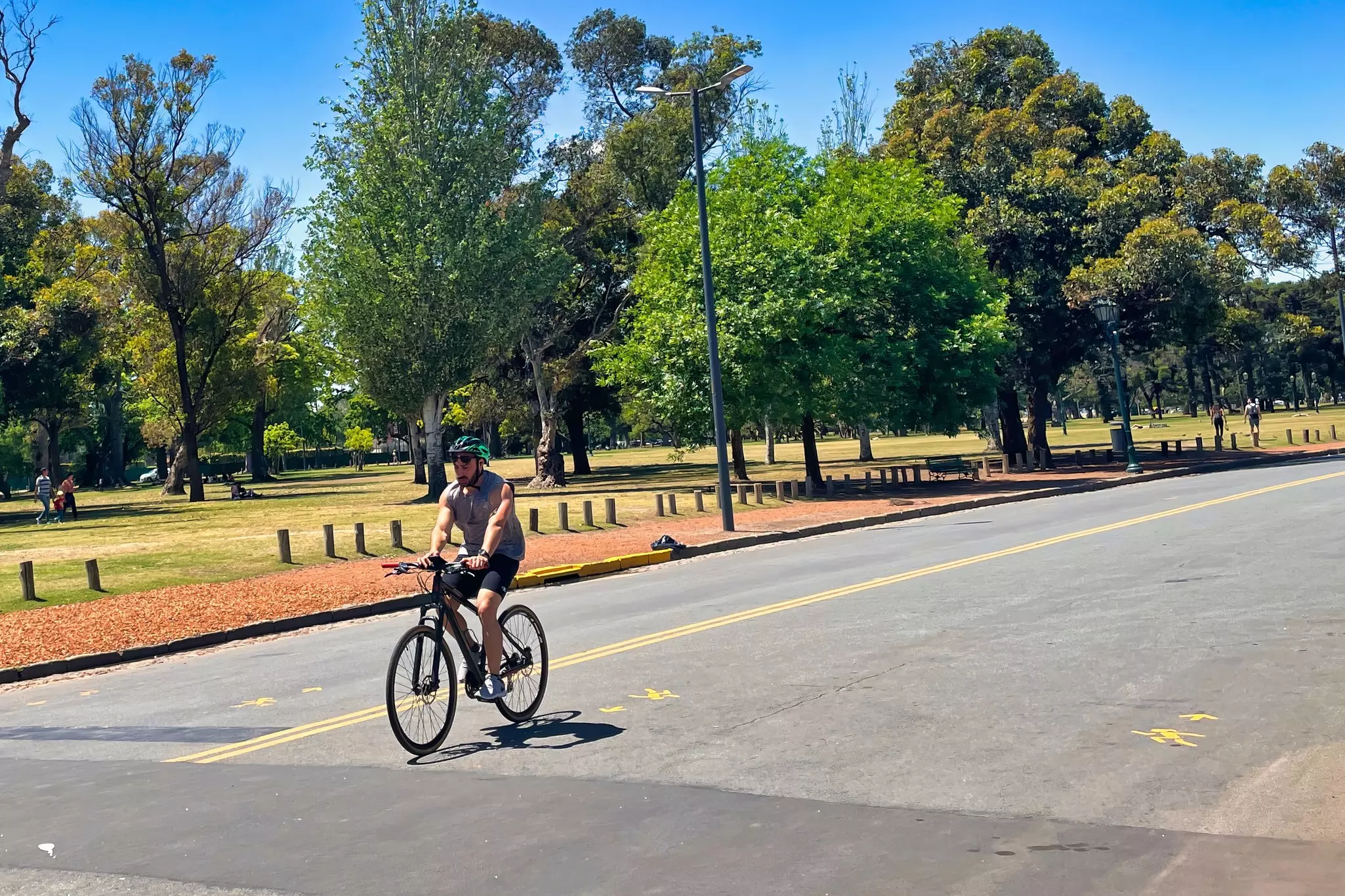 Person cycling around Rosedal de Buenos Aires