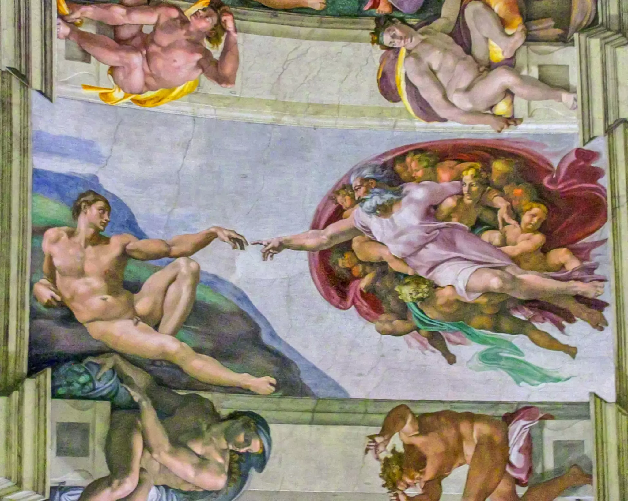 Michelangelo's fresco of God reaching out to touch Adam's finger on the Sistine Chapel ceiling