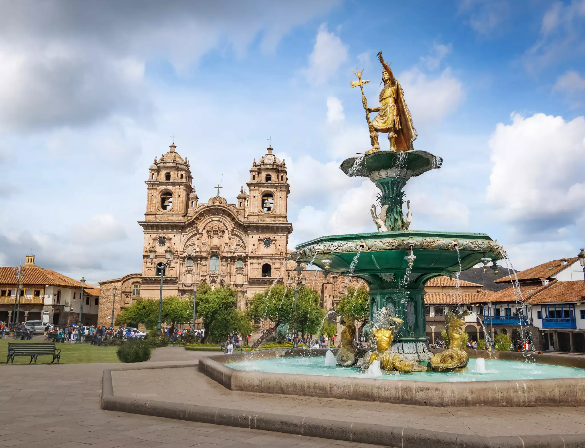 Inca Fountain and Iglesia de la Compania de Jesus Church at Plaza de Armas (Main Square) - Cuzco, Peru