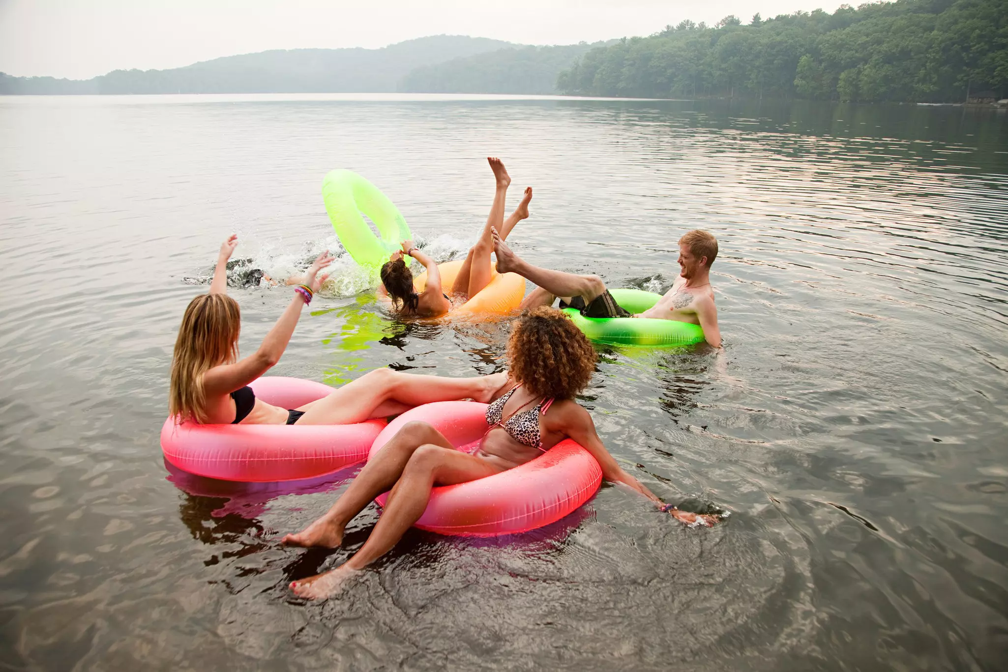 The long, warm summer is the time to get wet in New York State's lovely lakes © Image Source / Getty Images