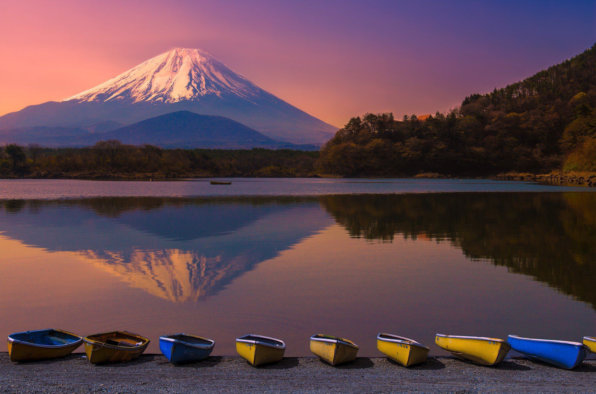 Mt Fuji with tranquil lake in foregournd.