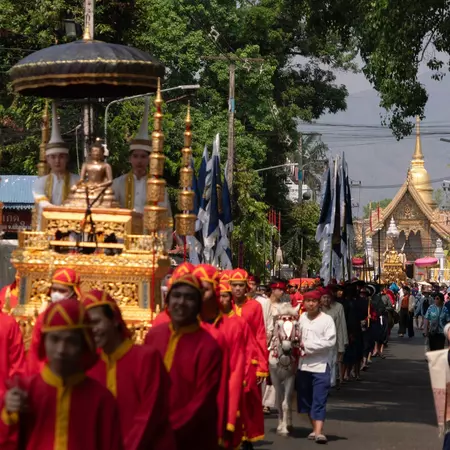Golden Buddha statues are bathed in Chiang Mai, Thailand for Songkran. bamgraphy/Shutterstock