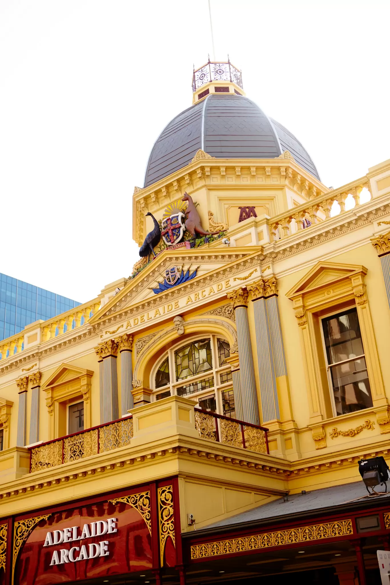 Low angel view of the historic Adelaide Arcade facade 