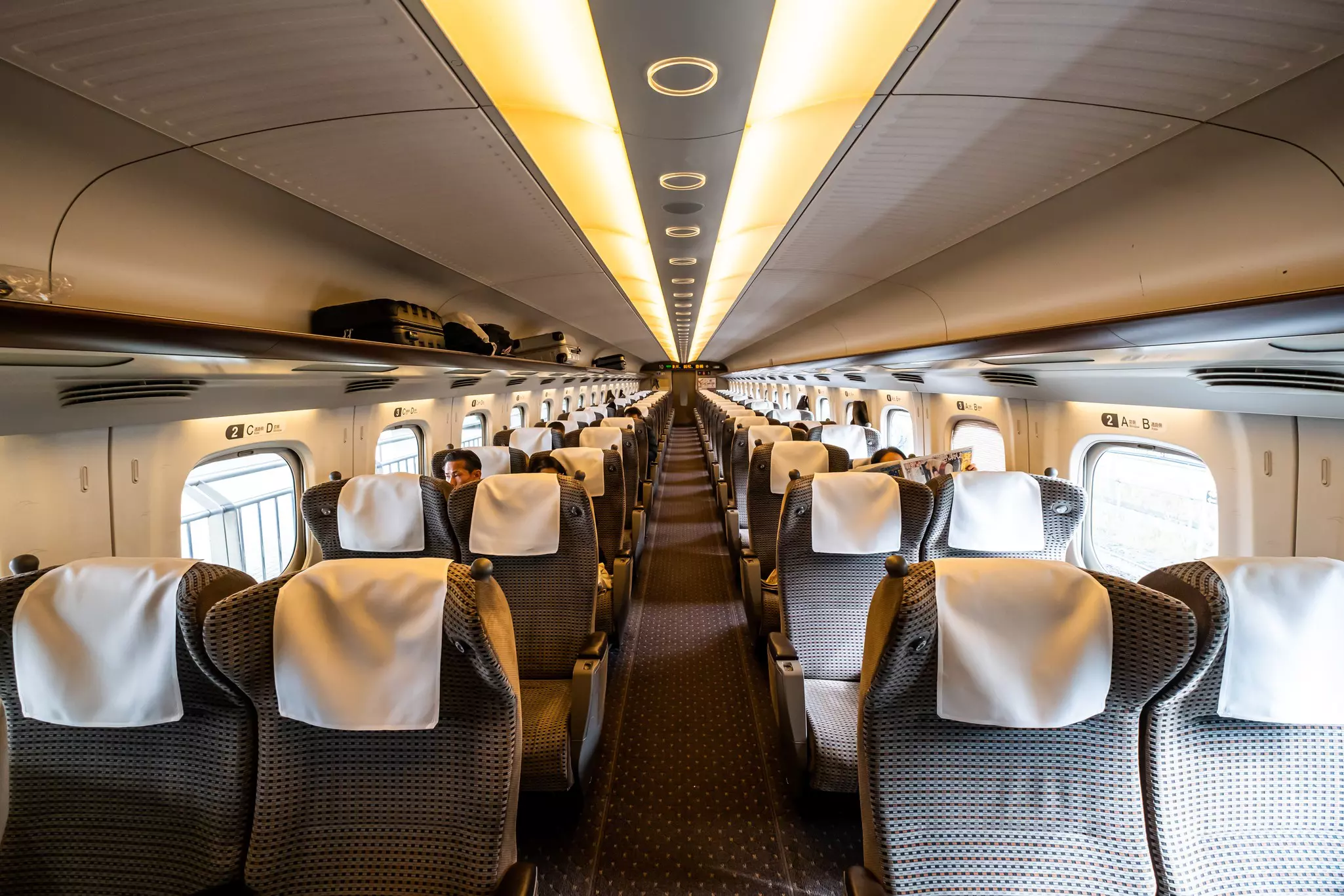 Interior of JR Tokaido / Sanyo Shinkansen N700 series train green car (business class) with comfortable seats