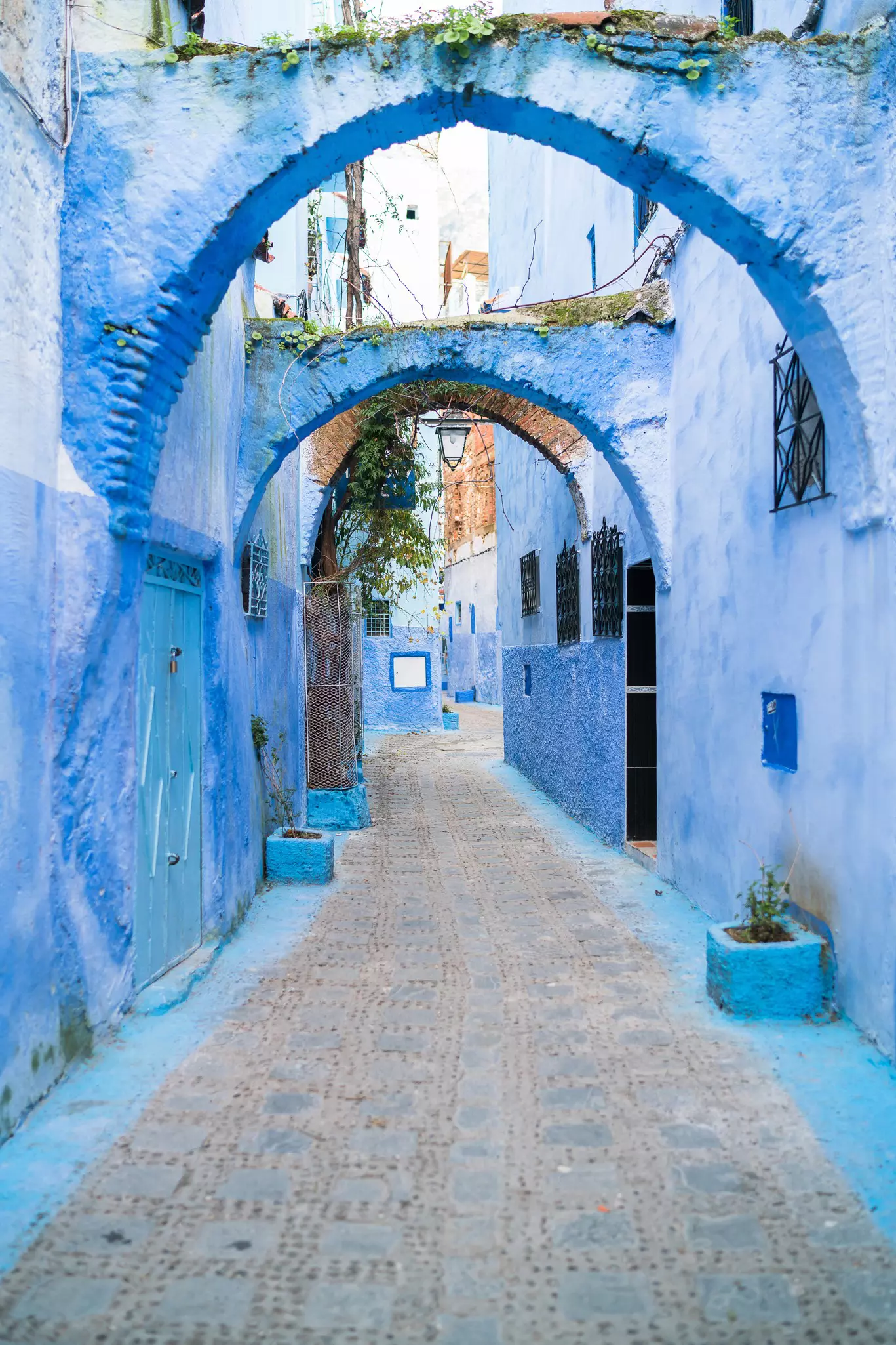 Blue walls and arches in Chefchaouen.