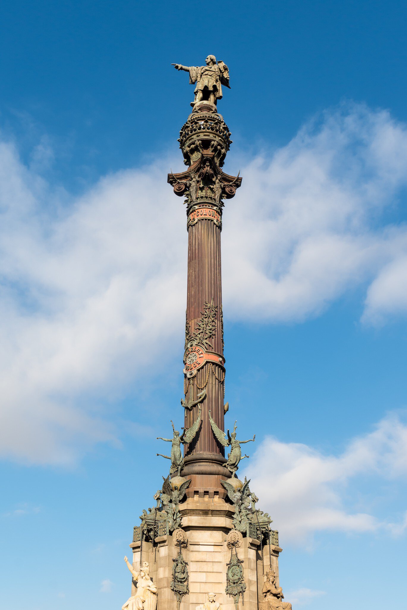 View of the Mirador de Colom (Columbus Monument) on a sunny day in Barcelona, Spain.