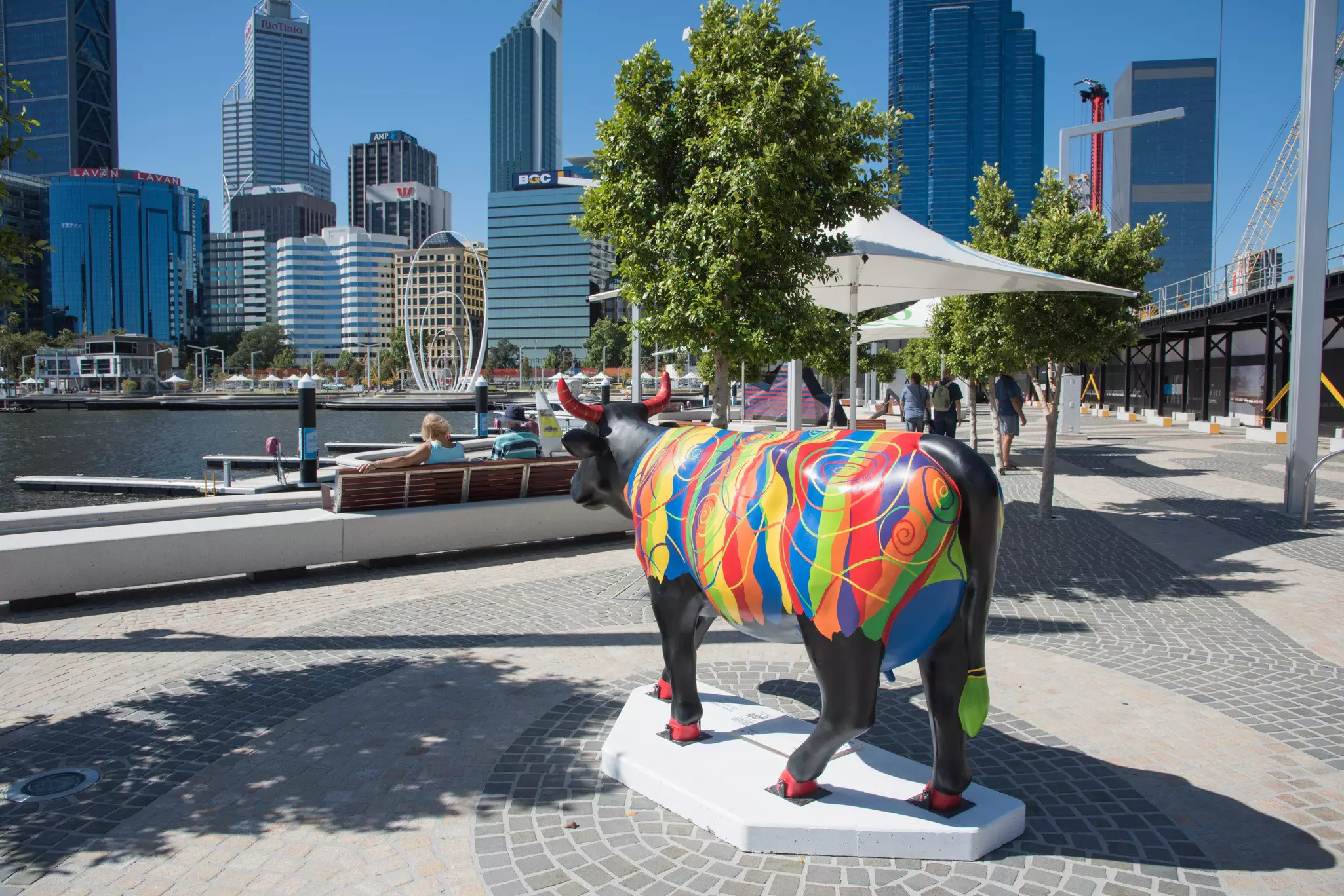 Elizabeth Quay with bull sculpture and tourists in Perth,Western Australia/Bull Art at Elizabeth Quay/