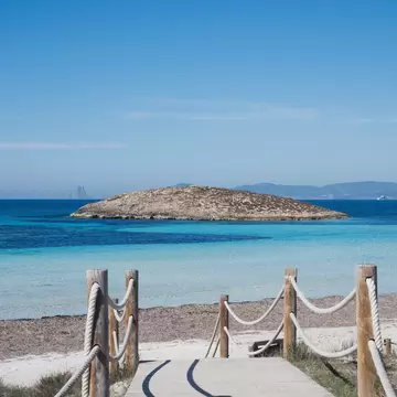 View of an islet from Platja Illetes on the island of Formentera in Spain.