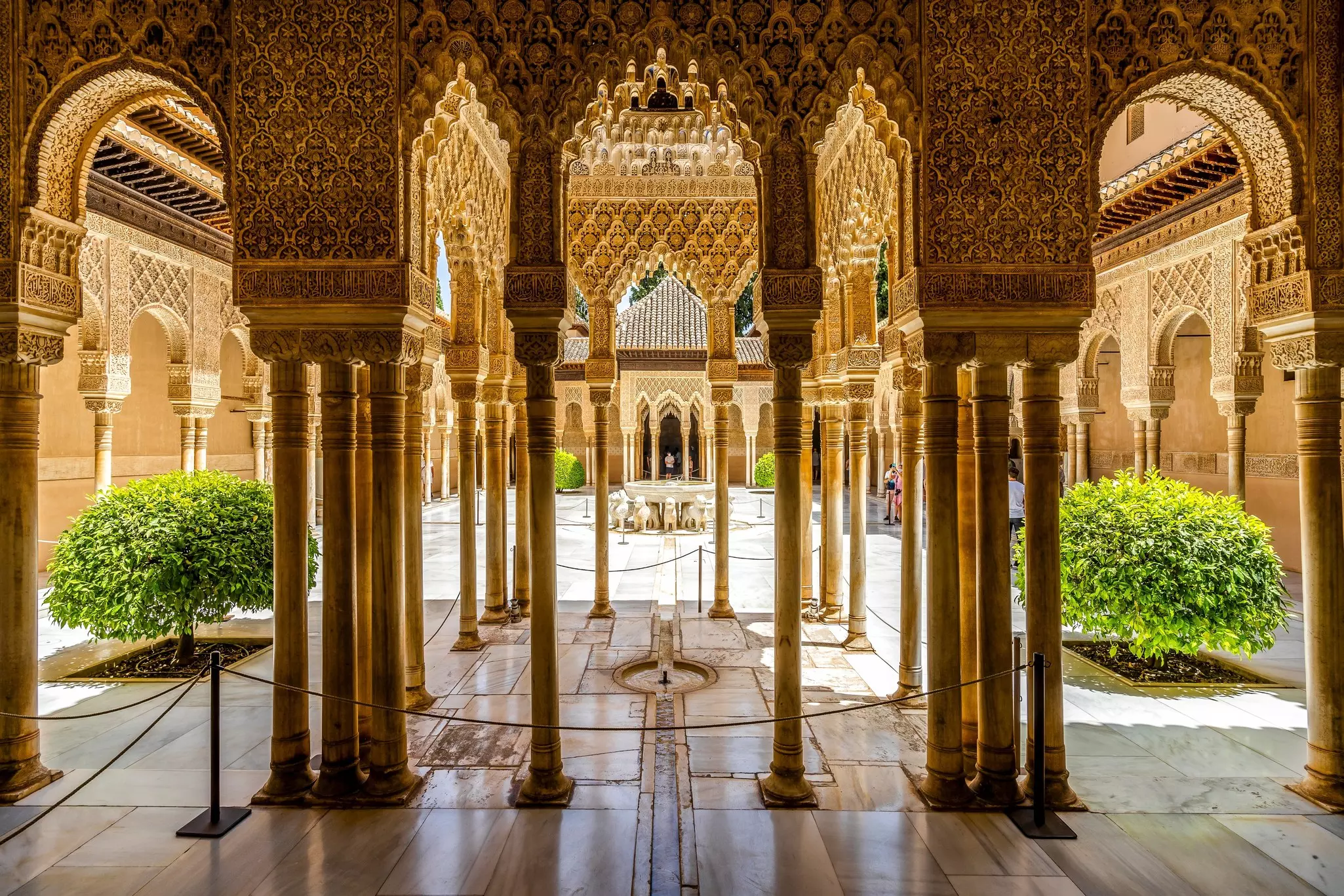 The Court of Lions with its famous marble fountain surrounded by elegant columned arches