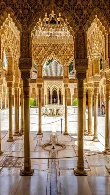 The Court of Lions with its famous marble fountain surrounded by elegant columned arches