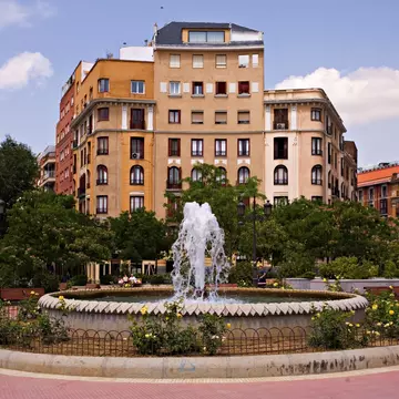View of a fountain in the Plaza de Olavide in the Chamberi district of Madrid, Spain.