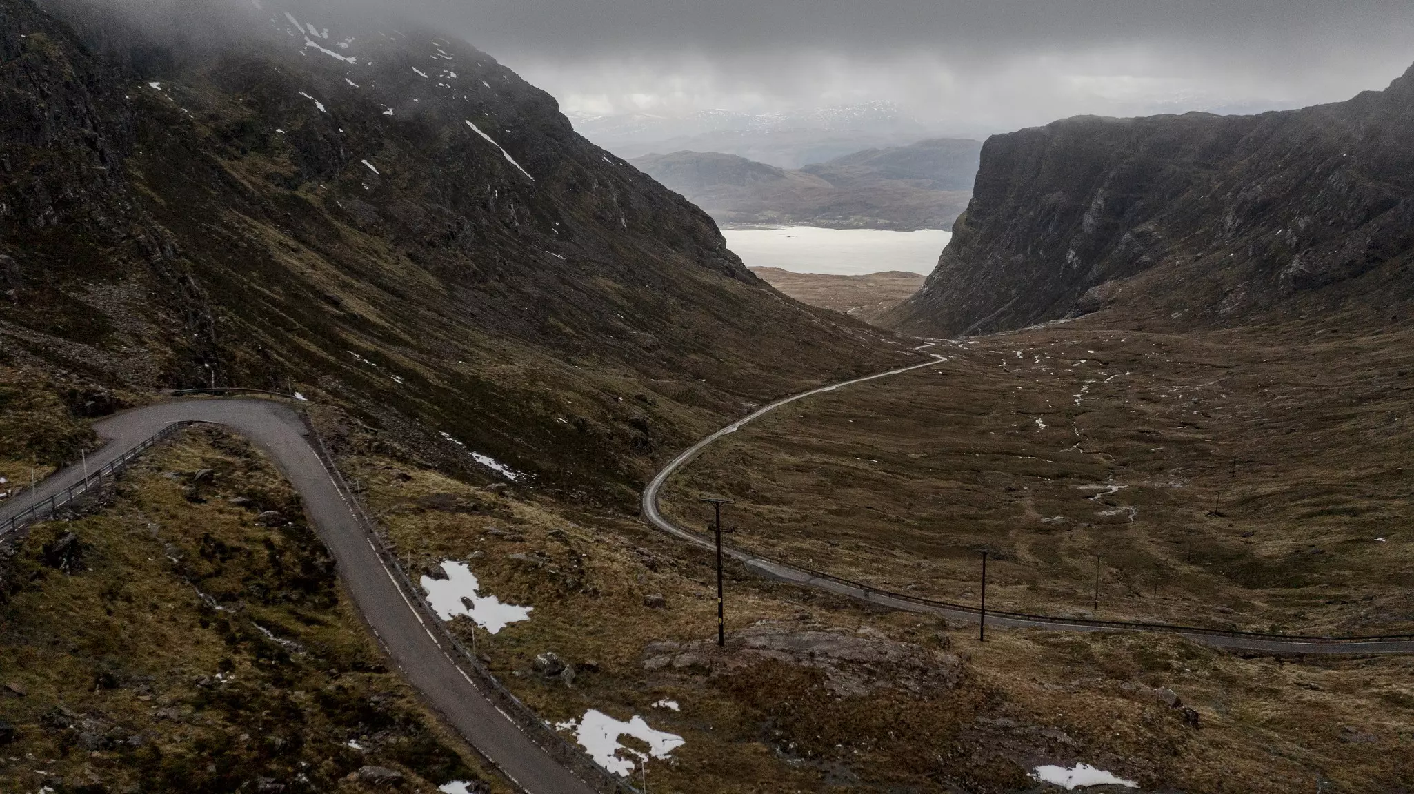 The Bealach na Bà, a winding, single-track road in the Scottish Highlands that passes through the Applecross peninsula on the NC500 route.