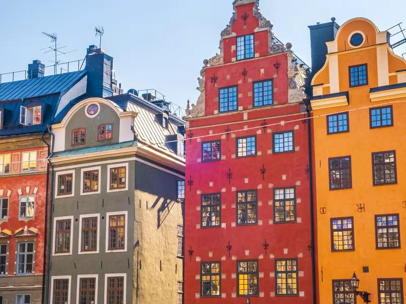 Colorful historic buildings and houses in the old town area of Gamla Stan in Stockholm, Sweden.