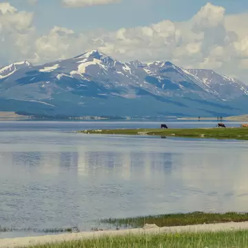 Mongolian Altai. Khoton Lake lies at the foot of the Altai Mountains near the Chinese border. Height about 2000 m above sea level. Nature and travel. Mongolia, Altai Tavan Bogd National Park; Bayan-Olgii Province
