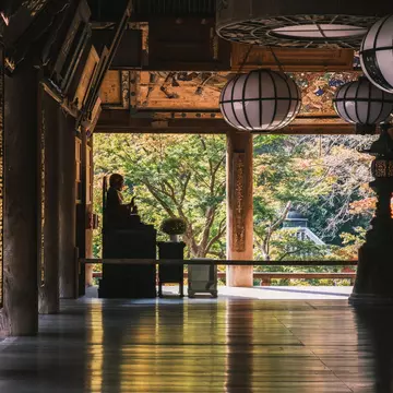 NARA, JAPAN - November 5, 2021 A historic temple in Nara with beautiful autumn foliage, A nostalgic space with a Buddha statue standing in the back, Hasedera Temple, License Type: media, Download Time: 2025-02-20T21:52:43.000Z, User: katelyn.perry_lone...